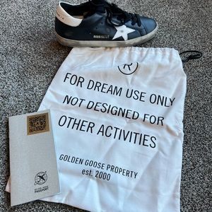 Size 37 (size 7) women’s Golden Goose sneakers. Only worn 2 times!